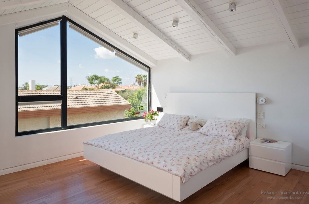 Дизайн білої спальні у стилі мінімалізм