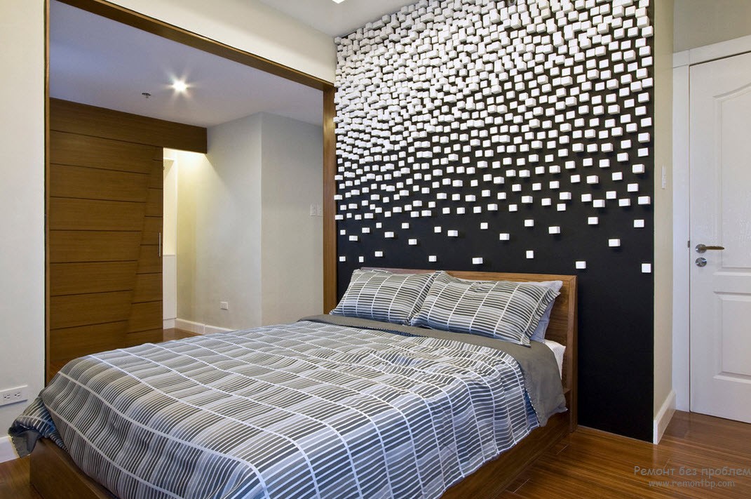 М'який чорно-білий інтер'єр спальні з додатковим кольором
