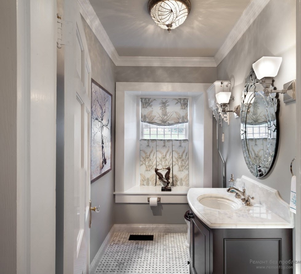 Світлий відтінок сірого перлів дуже виграшно виглядає в інтер'єрі ванної кімнати.