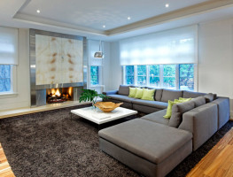 Современный стиль для оформления гостиной частного дома