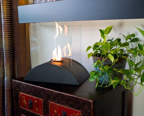 Полукруглый камин на комоде Полукруглый камин на комоде