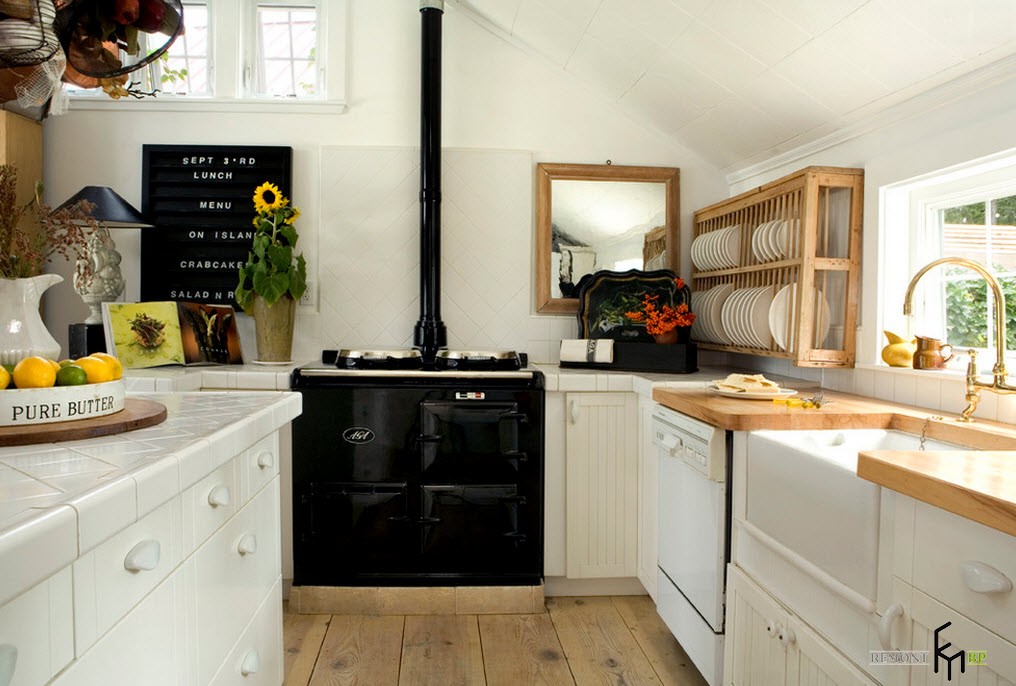 Черная плита в кухне скандинавского стиляЧерная плита в кухне скандинавского стиля